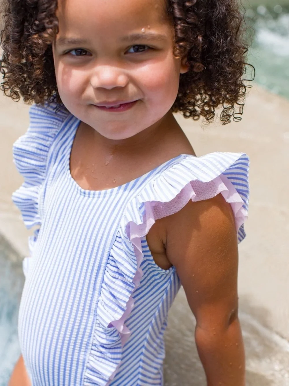 RuffleButts Periwinkle Blue Seersucker Waterfall One Piece UPF 50+ Size 2T